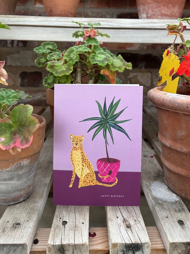 leopard and plant birthday card