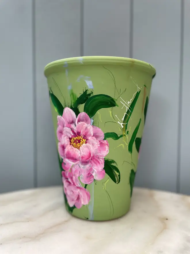  terracotta plant pot hand painted floral terracotta plant pot green background with pink peony flowers.