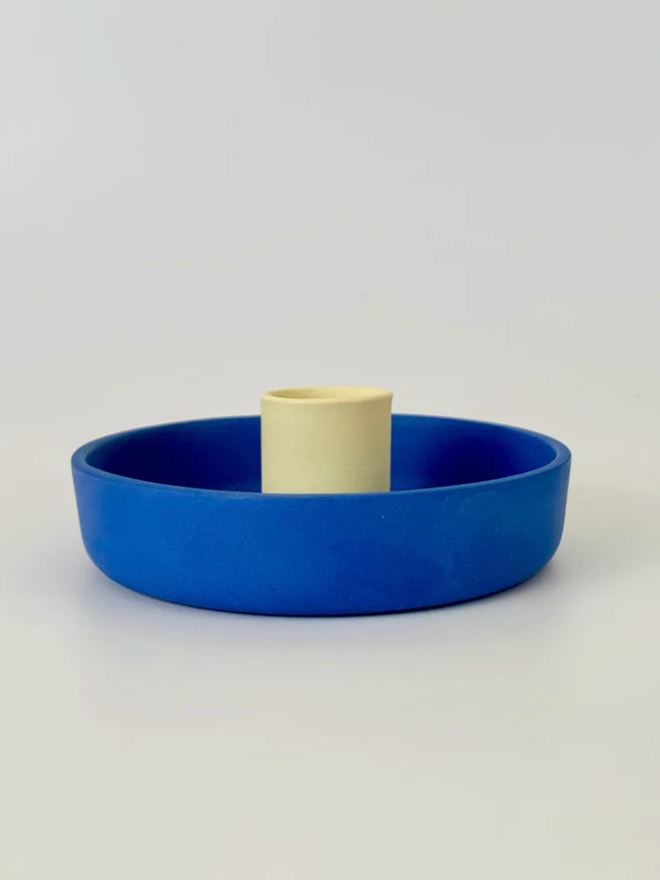 Candle Holder. A blue candle holder.