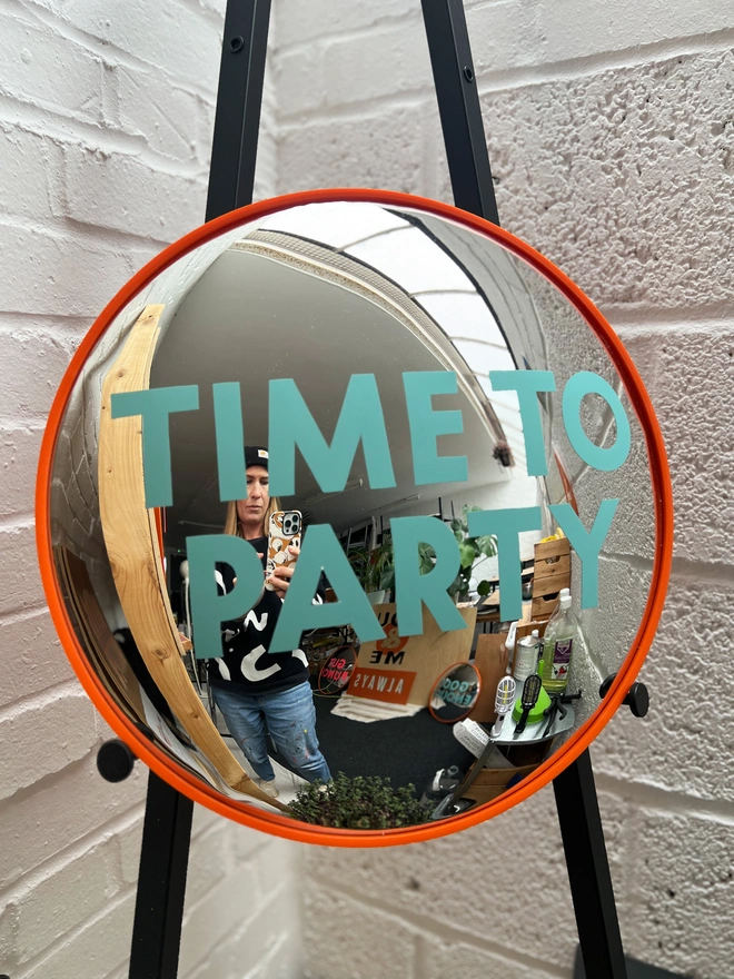 Convex painted mirror time to party