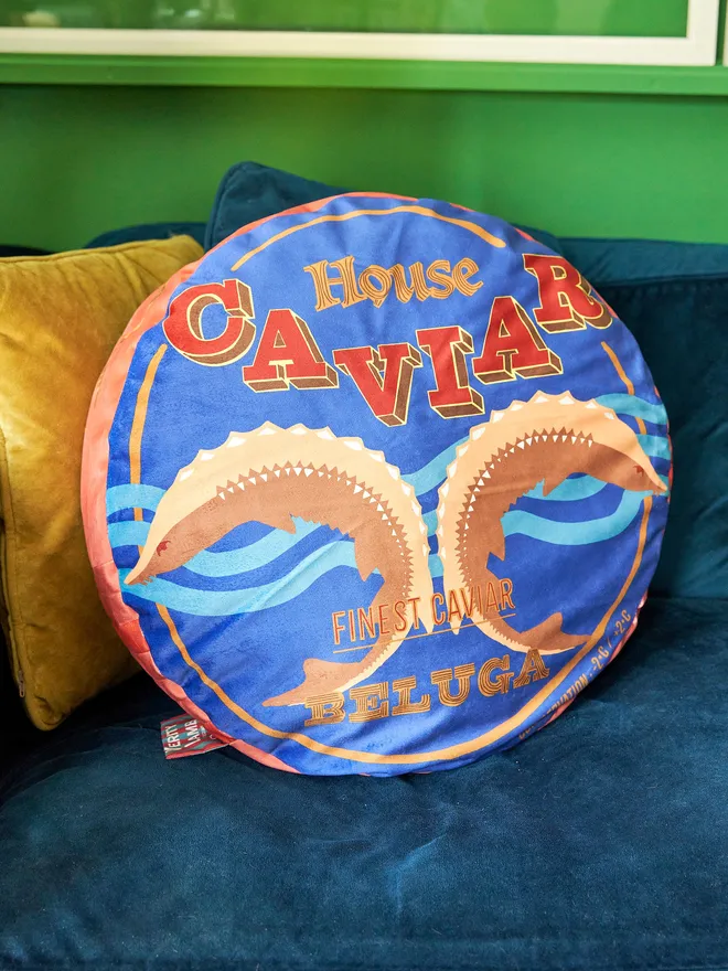 circular velvet cushion in caviar tin design