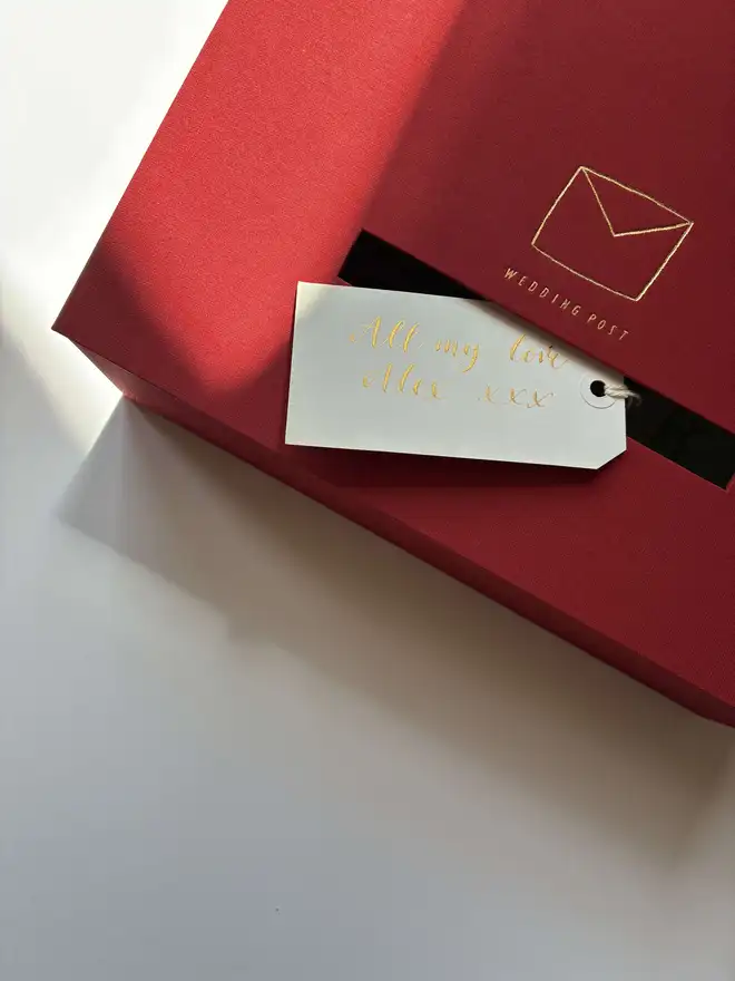 Handmade wedding postbox in traditional red cloth with gold foil detail