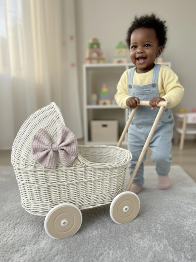 Cream pram with bow&bedding included 