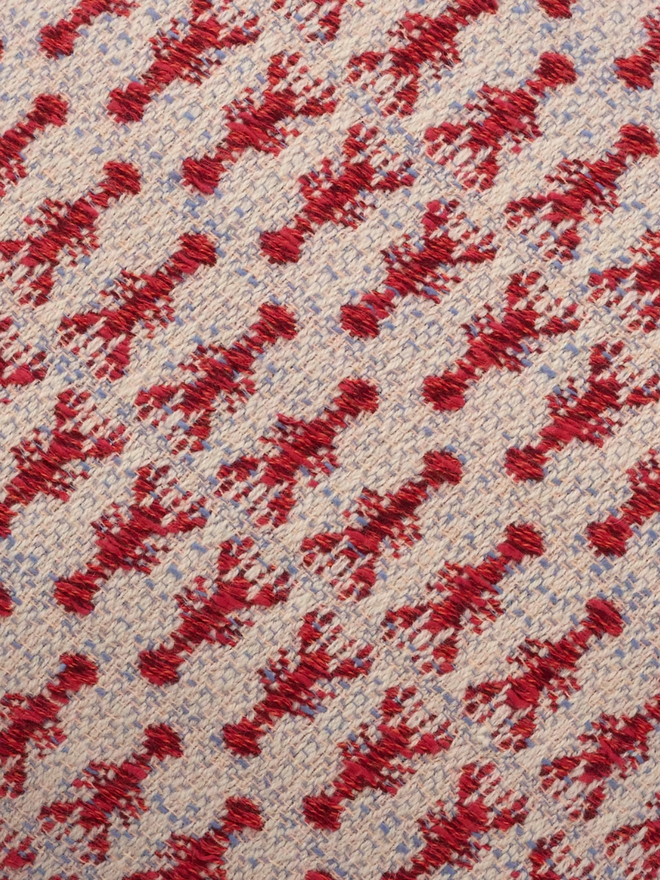 lobster square cushion. a close up of pink and red lobster embroidery.