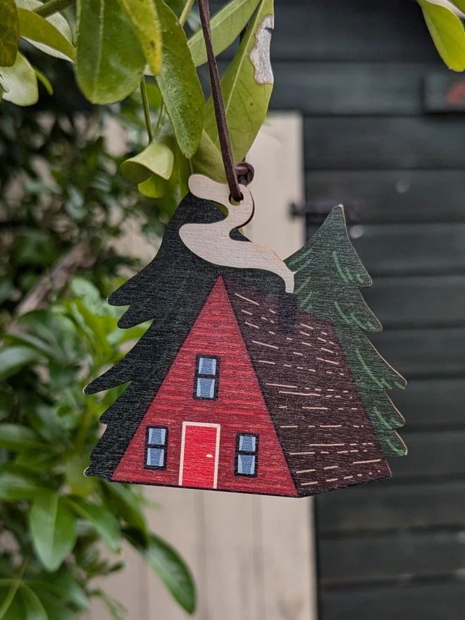 red cabin wooden Christmas decoration