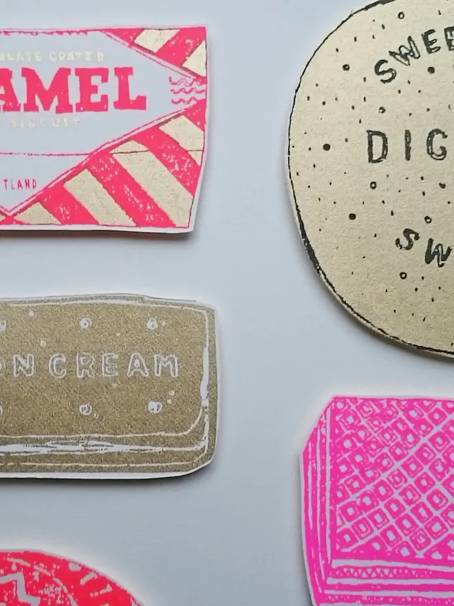 Family Favourites XL A3 Biscuit Screenprint, a collection of colourful biscuit designs on a white screenprint. 