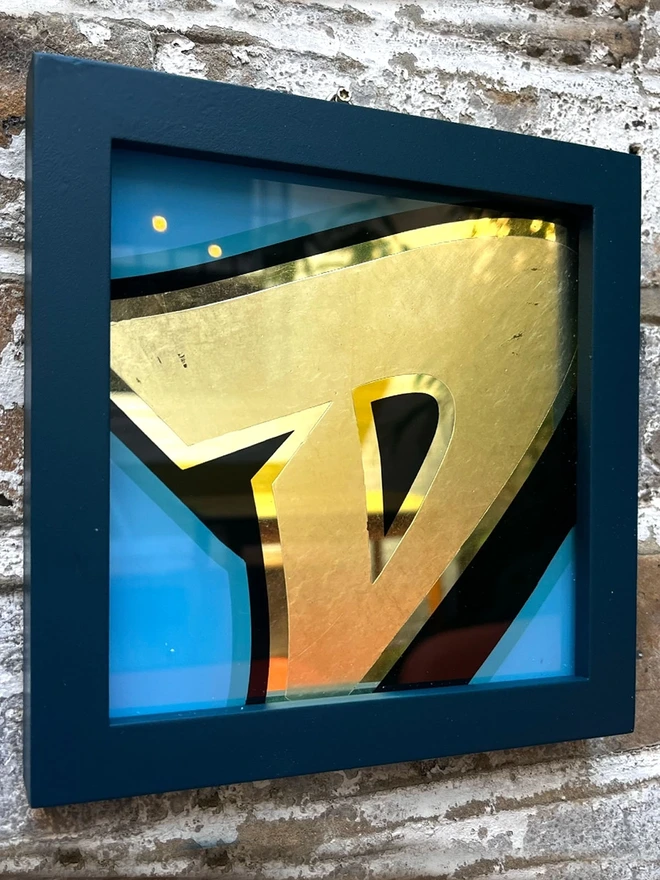 Gold leaf letters framed