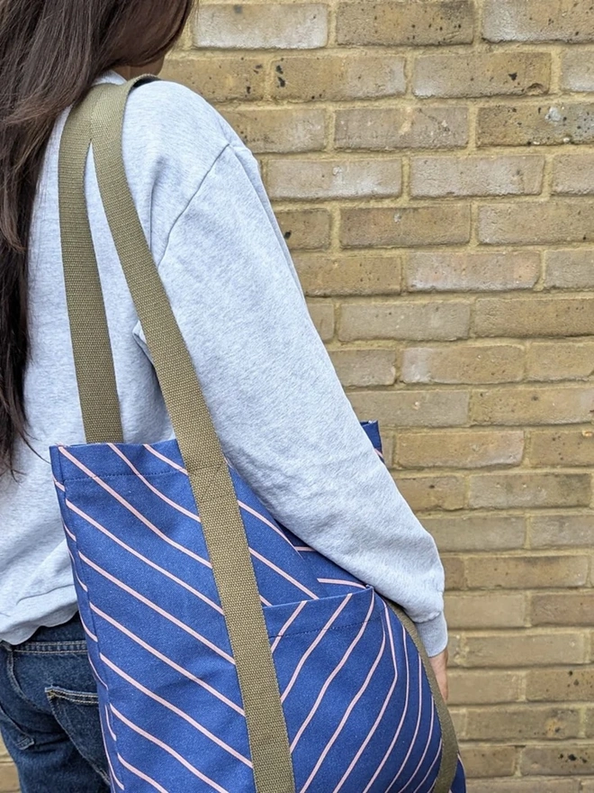 Tote Cotton Shopper Bag, a woman holding a colourful patterned tote bag over her shoulder. 