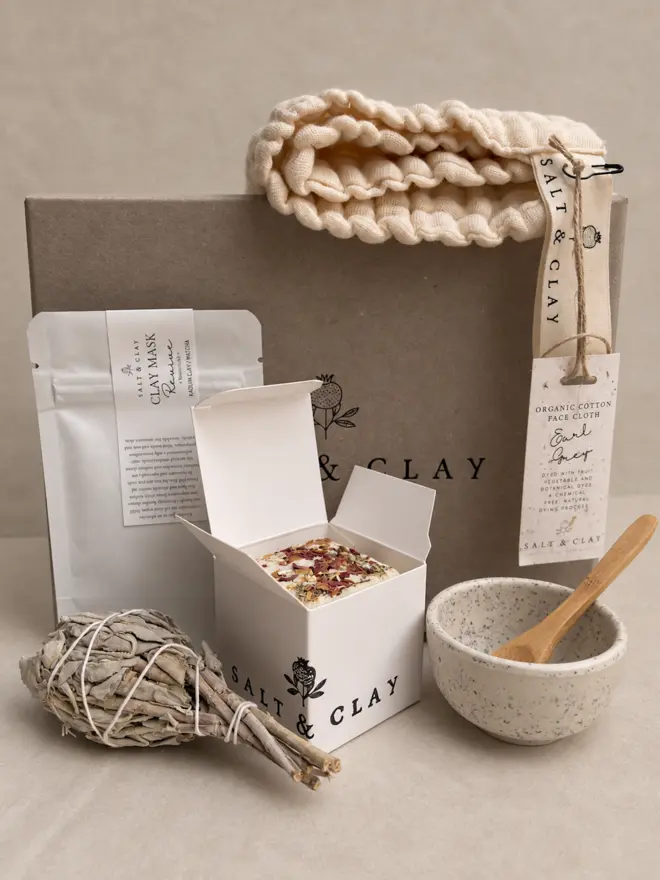 a handmade calming rituals gift set with a grey card box with the SALT & CLAY logo. 