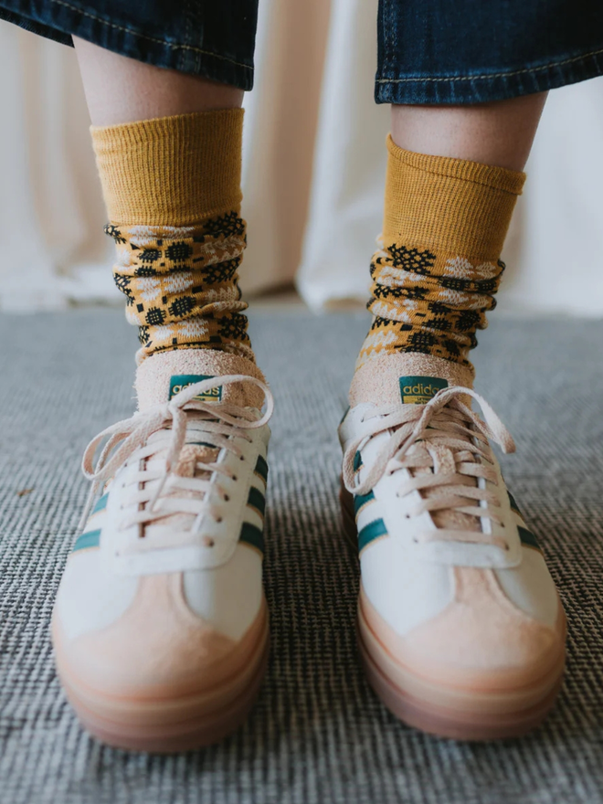 yellow brown knitted socks with sneakers