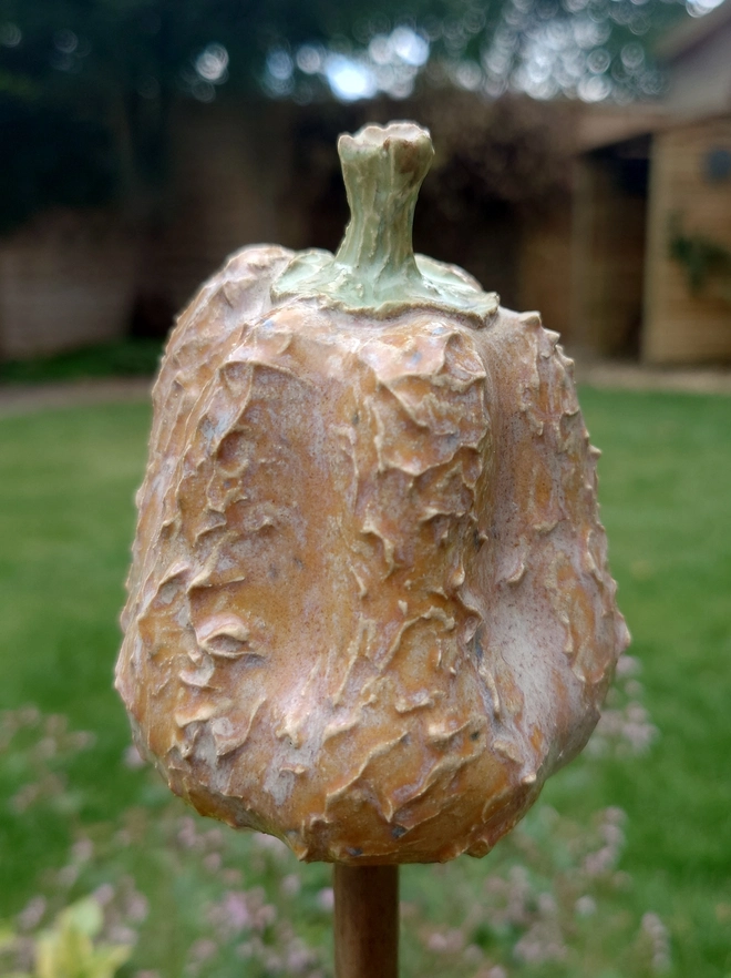 Stoneware pumpkin can topper