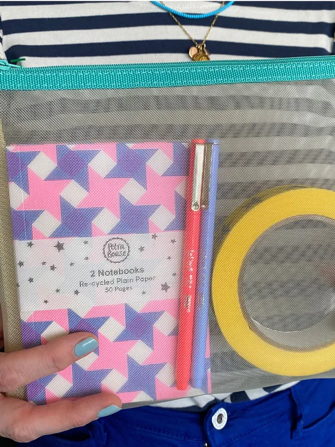 A6 Pocket notebooks plain with risograph printed covers in a handy bag
