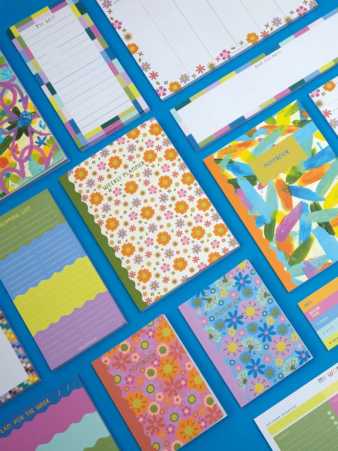 Flatlay of other colourful stationery items from the Raspberry Blossom ‘Happiness’ Stationery collection