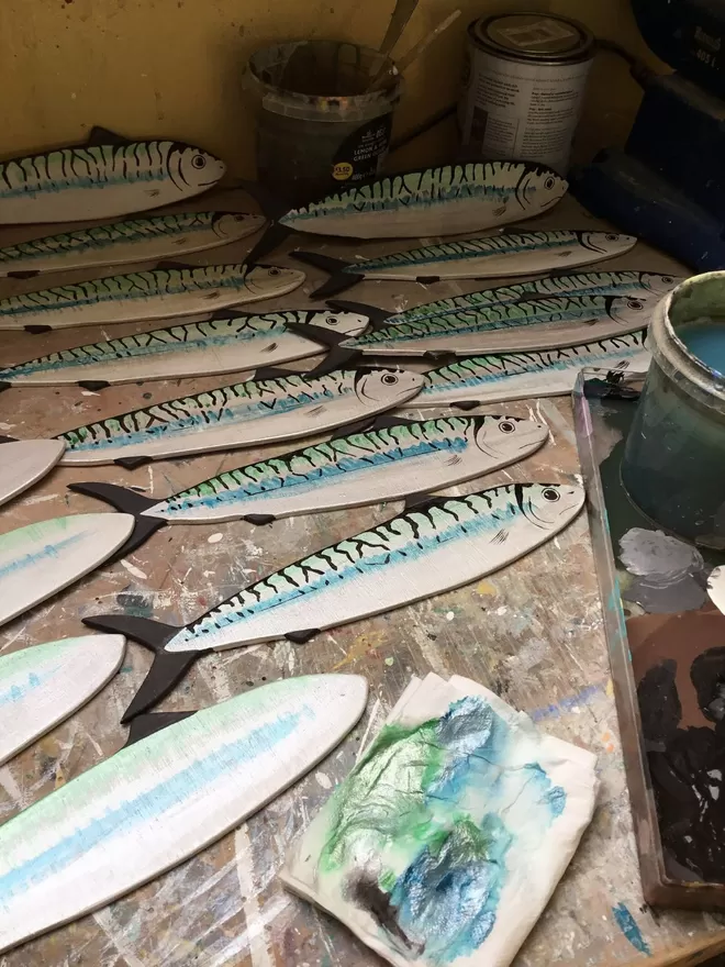 some mackerels finished and painted whilst others are waiting to be painted and are in process
