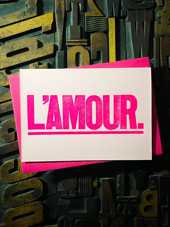 L’Amour! A beautiful wooden type letterpress card printed with rich fluorescent pink ink on thick Candy Pink card with a luxury matching envelope; ideal to send a to a friend or loved one.