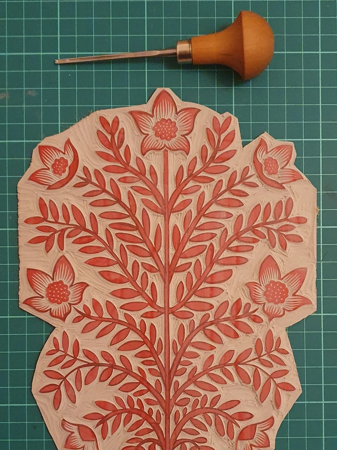 A4 Linocut print of symmetrical flower design