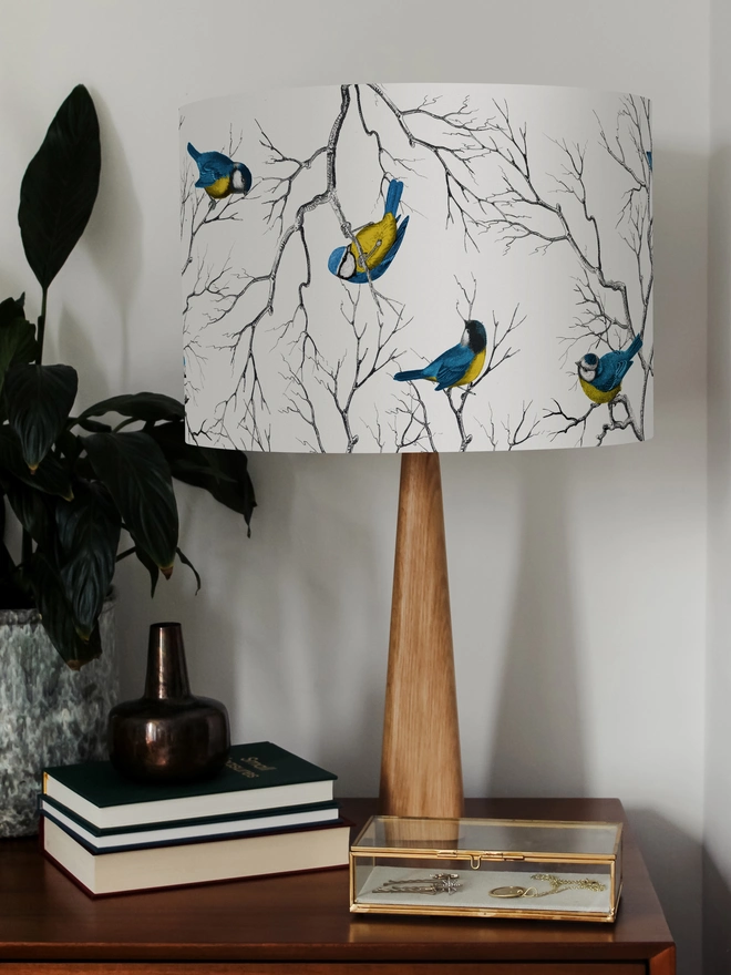 Blue Tit lampshade featuring a playful pattern of colourful British garden birds.