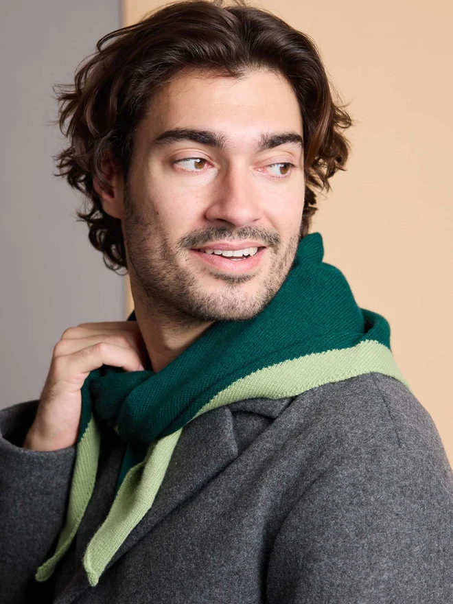 man wearing green wool neckerchief