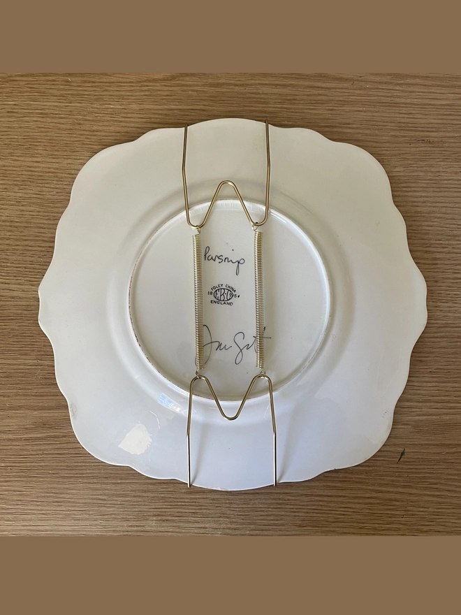 back of plate - painted parsnip on vintage plate