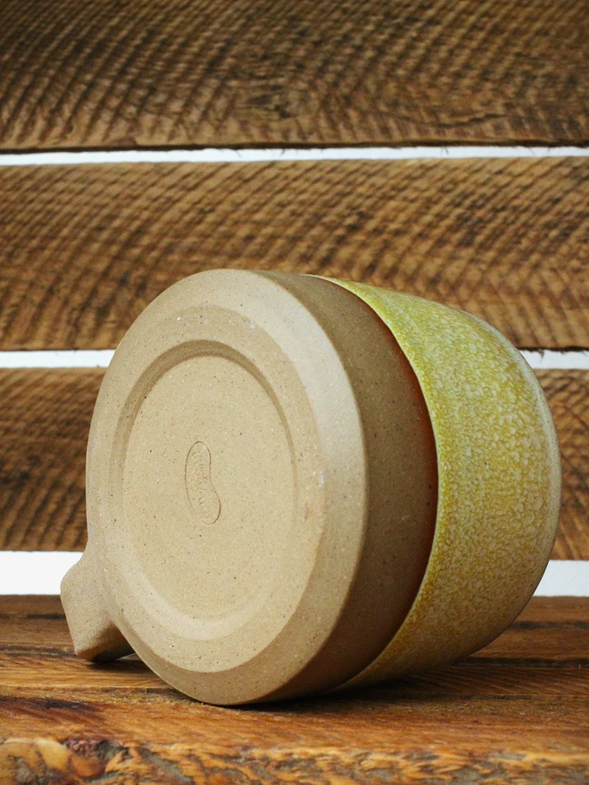 yellow handmade ceramic cup