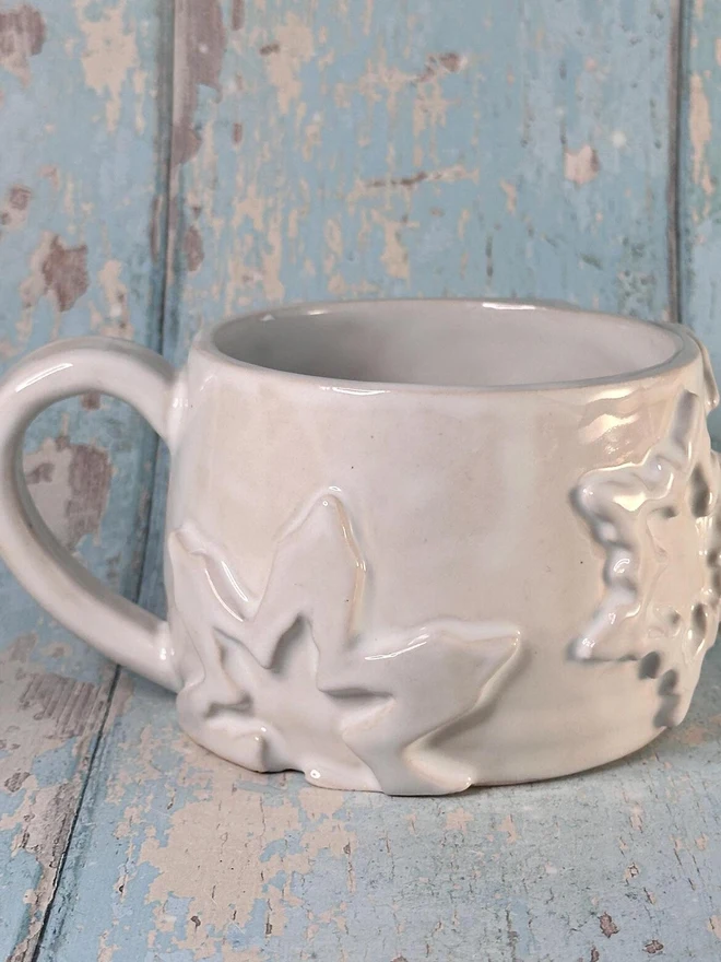 white snowflake mug