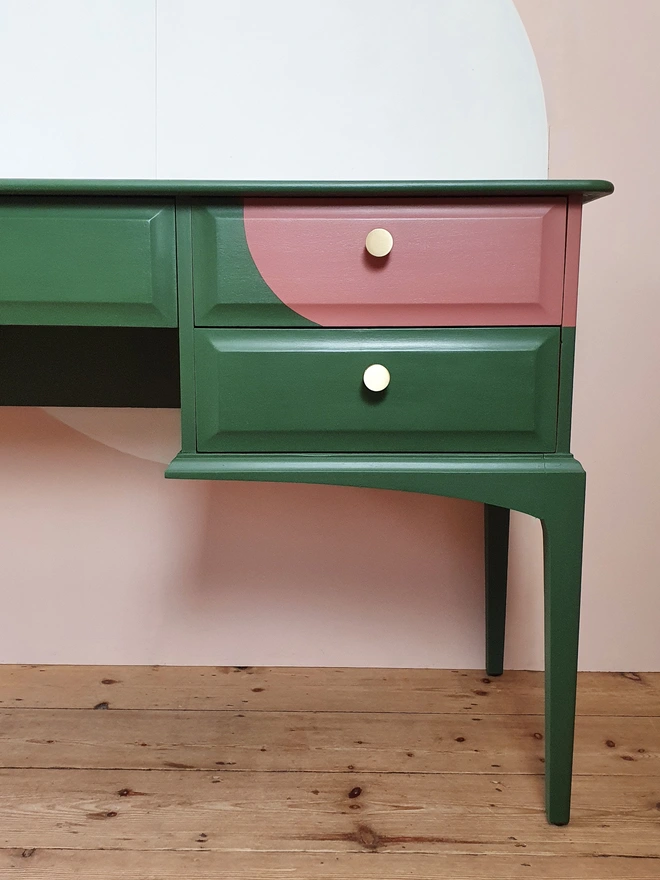 Pink and green asymmetric design dressing table