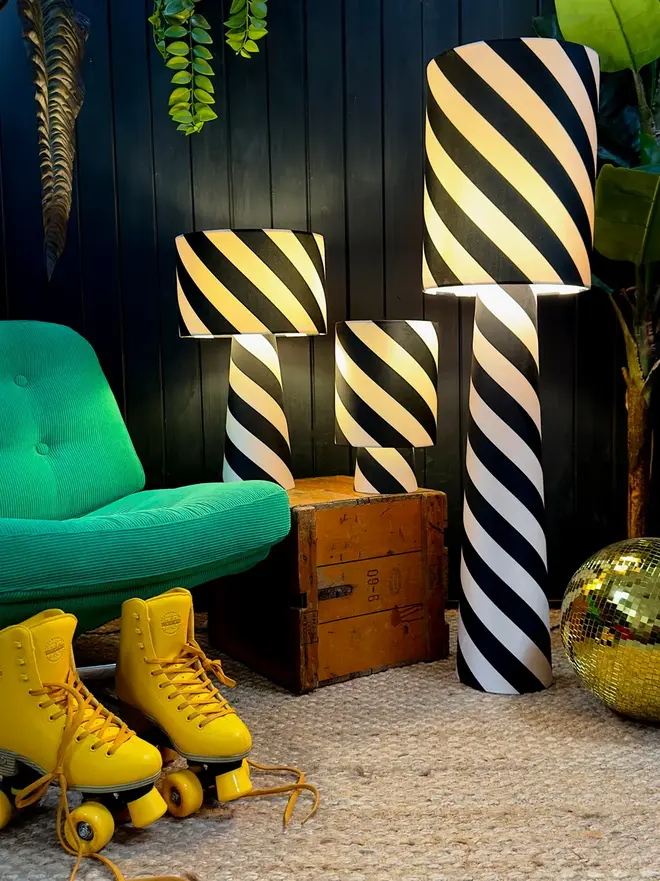 Portable Helter Skelter Velvet Lamps, in a room. 