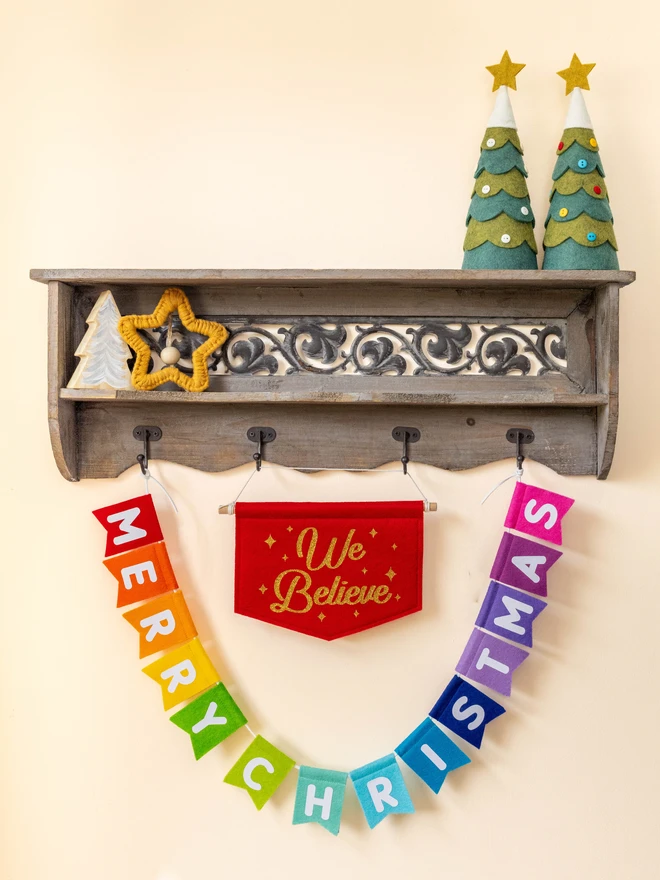 Rainbow Christmas bunting that reads 'Merry Christmas'