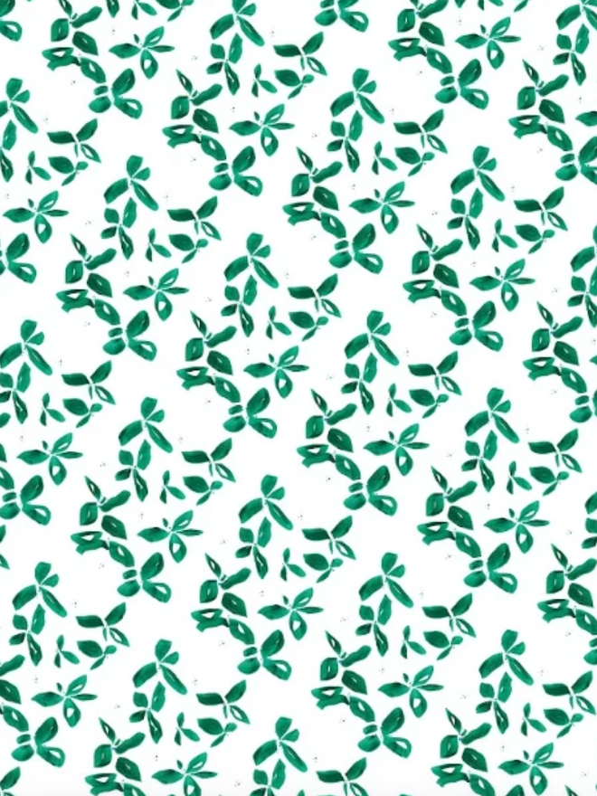 Emerald Leaves Muslin. A muslin patterned with green leaves.