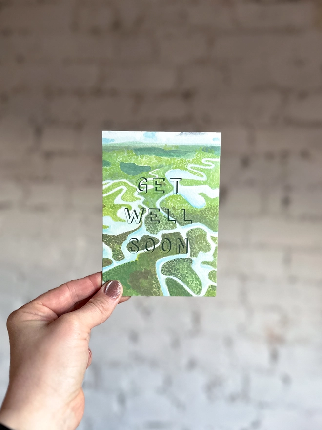 a greetings card featuring an illustration of the Everglades National Park with the text “GET WELL SOON”