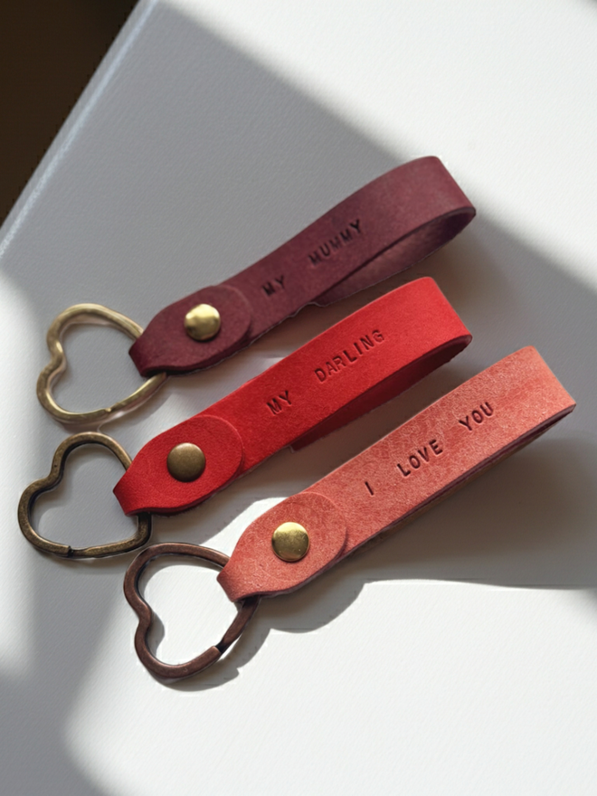 Leather keyrings stamped with I love you, and My Mummy