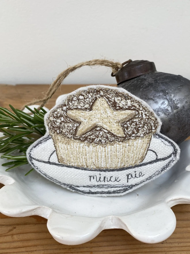 Embroidered Mince Pie Fabric Decoration on a plate with bauble