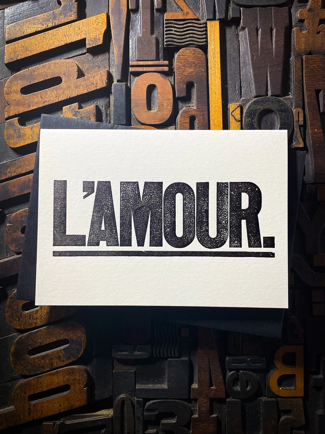 L'AMOUR. Perfect to send a special message to a loved one. These cards are letterpress printed. The card is hand-fed into the press. Printed on the finest Colorplan Pristine White double-sided card.  Matching Colorplan 135gsm self-seal envelope.