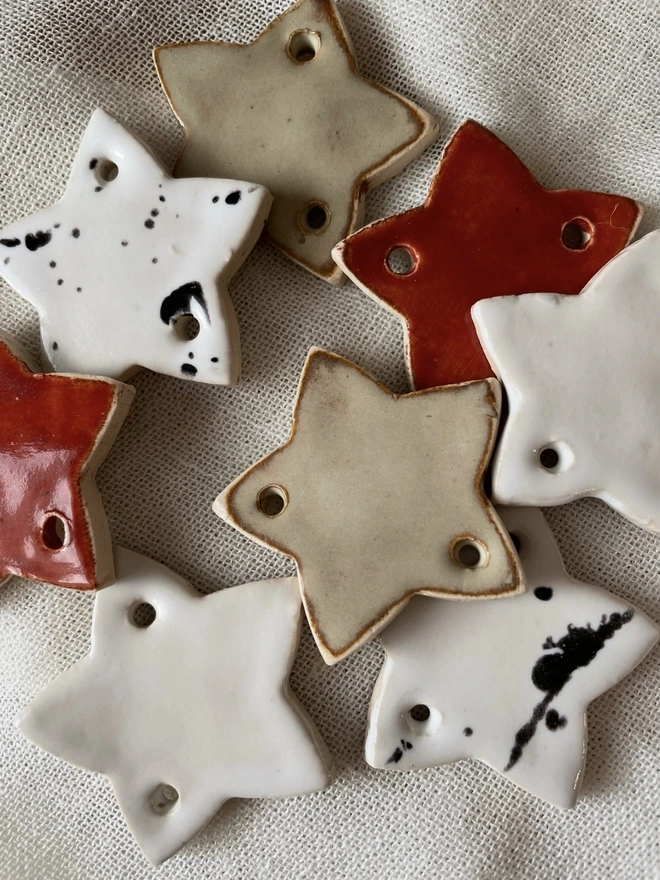 multiple ceramic napkin rings in various colours