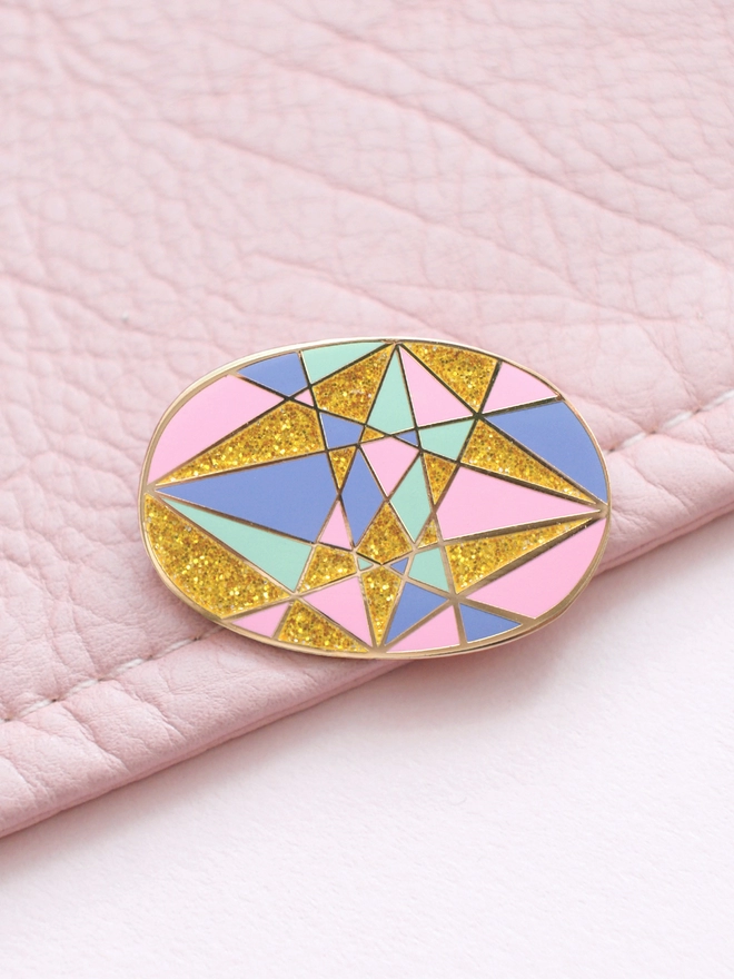 opal enamel pink badge on pink leather jacket