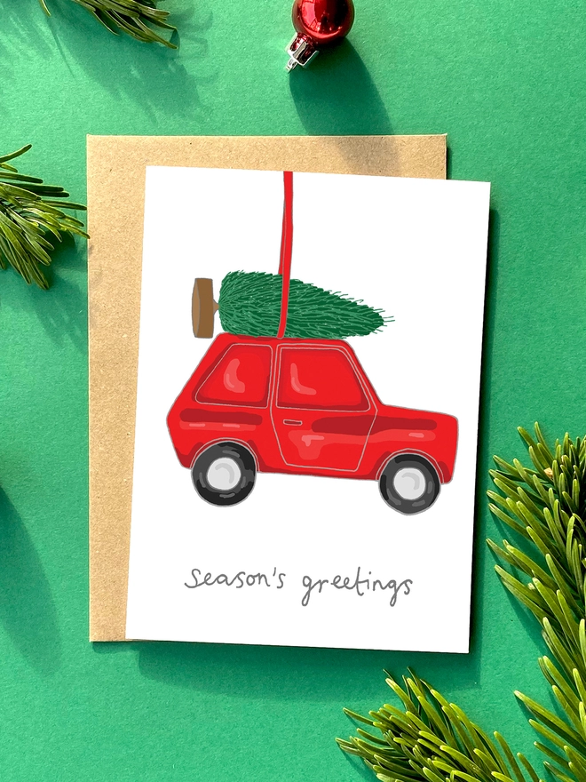 Christmas card featuring a jolly Christmas decoration 