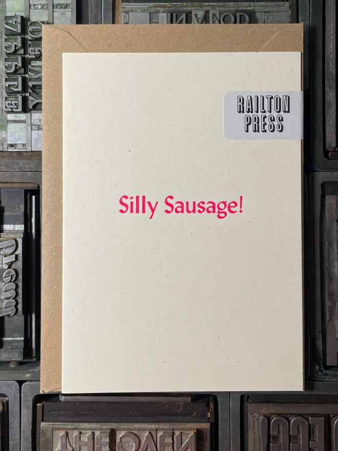 Silly Sausage Card. A card with simple pink lettering.