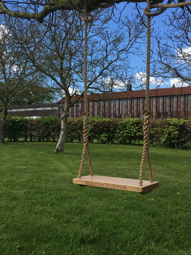 Swing engraved with The Coach House