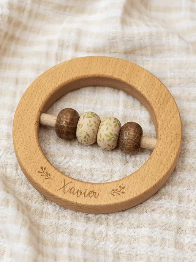 Ring Rattle with Walnut and Leaf Print Beads