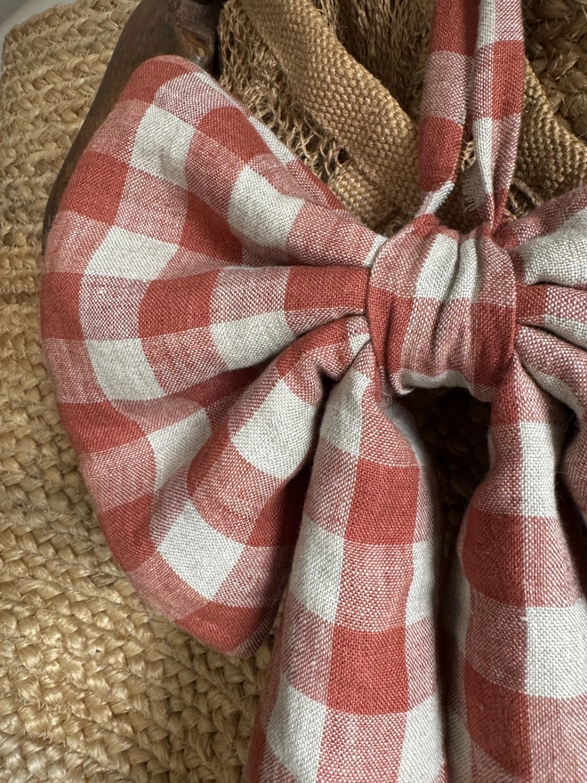 Close up of a rusty check gingham bow