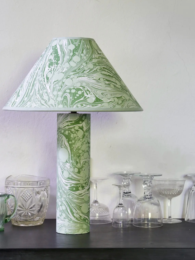 Marbled on Marbled Base & Shade. A green lampshade and base on a counter.