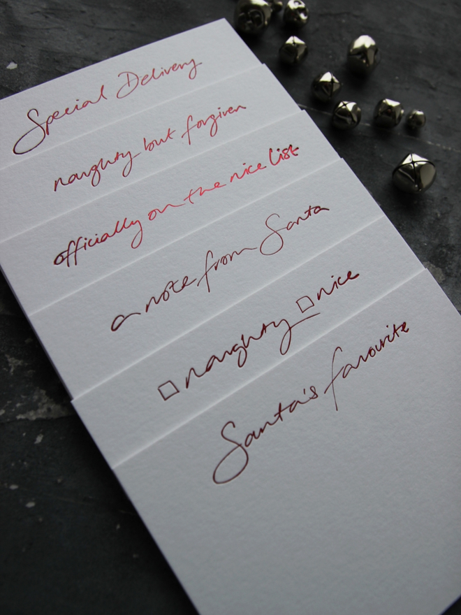 mixed set of hand foile Santa notecards blank for you to write messages, they come with matching envelopes foiled with North Pole Mail