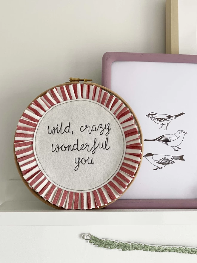 Pleated Personalised Embroidery Hoop on shelf with picture