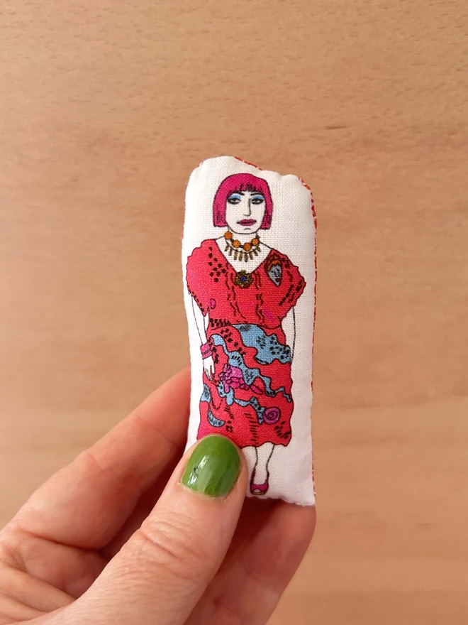 Mini illustrated fabric doll of British fashion and textile designer Zandra Rhodes.