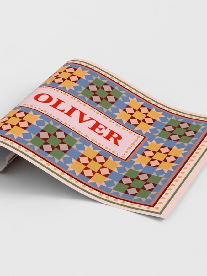 Custom name wall art featuring personalised patchwork print with a child's name taking centre stage, perfect for nursery and children's bedroom decor
