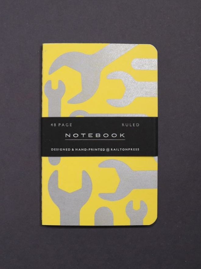 Lined Spanner Pocket Notebook. A notebook in bright yellow