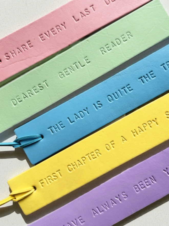 close up of personalisation on a pastel colour leather bookmarks,