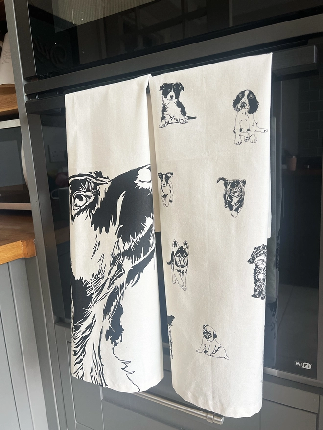 Folded springer tea towel on oven door
