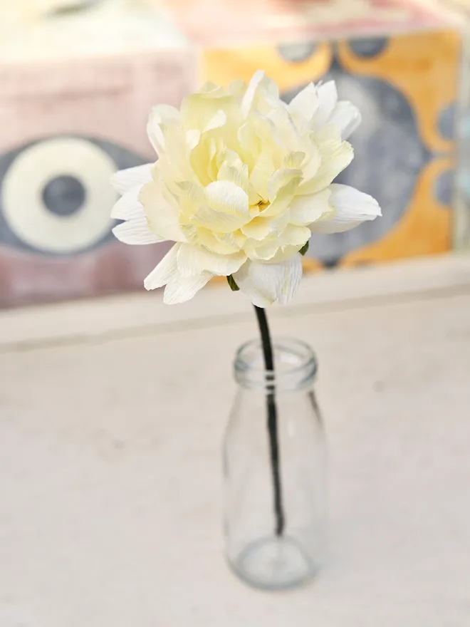 White crepe paper flower