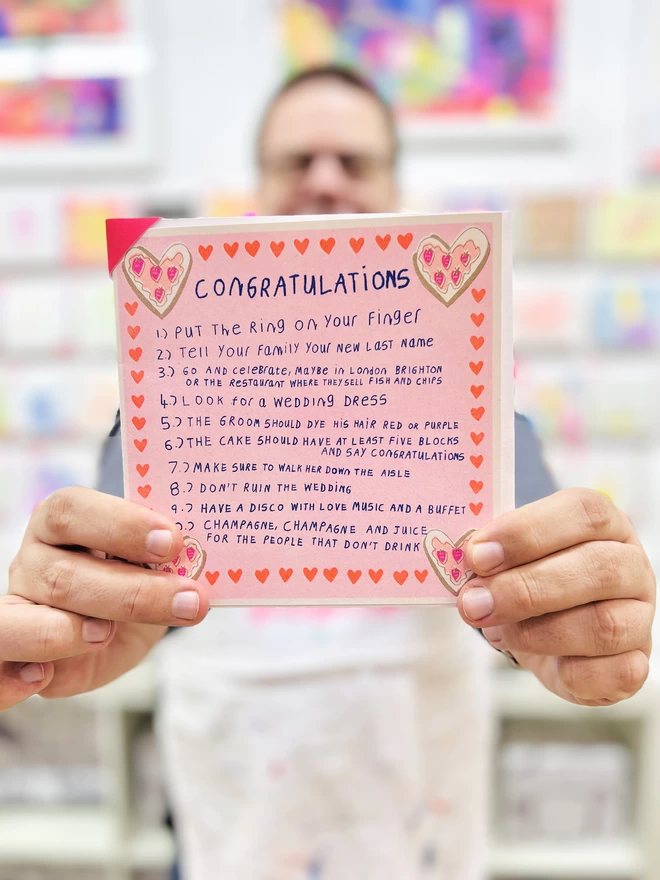 Put The Ring On Your Finger is an engagement card with funny instructions for a great wedding